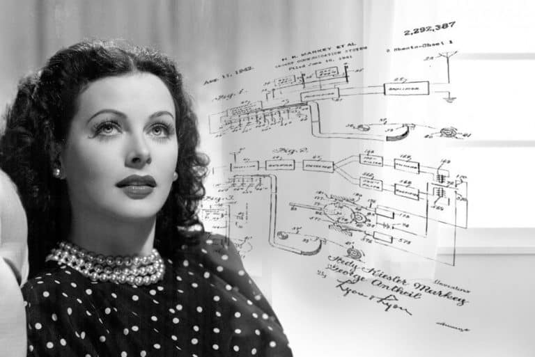 Black and white image of a woman in a polka dot dress with a double-strand pearl necklace. Behind her, there is a technical diagram featuring patent schematics and detailed notes.